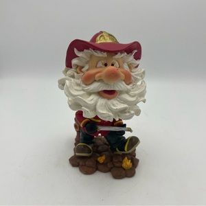 Holiday Christmas Around The World Fireman Santa Bobble Head Animated
Figurine
